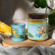 Bougie Minions Together Forever Petite Jarre, parfum gourmand et réconfortant aux notes de banane, noisette, lait, vanille et ca