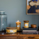 Bougie parfumée moyenne jarre Woodwick MIMOSA EN BORD DE MER 