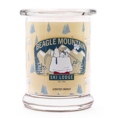 Bougie Peanuts Beagle Mountain aux notes de cerise, prune amande et bois chaud, pour une atmosphère sereine et naturelle.