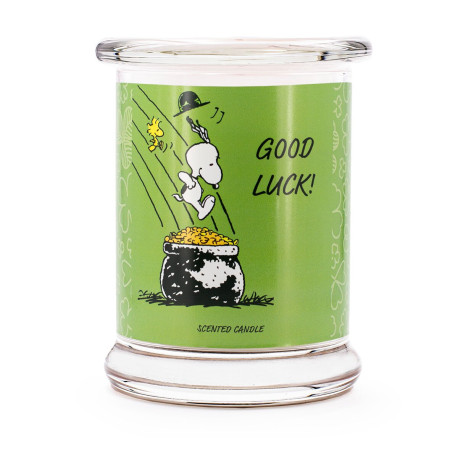 Bougie Peanuts Good Luck aux notes de pamplemousse, lime, clémentine et vanille-orange, pour une ambiance cosy et apaisante.