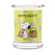 Bougie Peanuts Happy Easter aux notes d’ozone de pomme, orange musquée et jasmin, pour une atmosphère printanière et joyeuse.